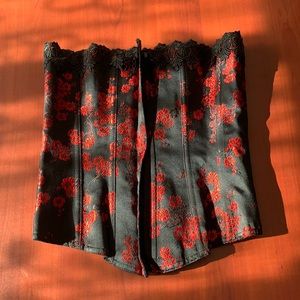 Brand new without tags Tesa black corset with red patterns.